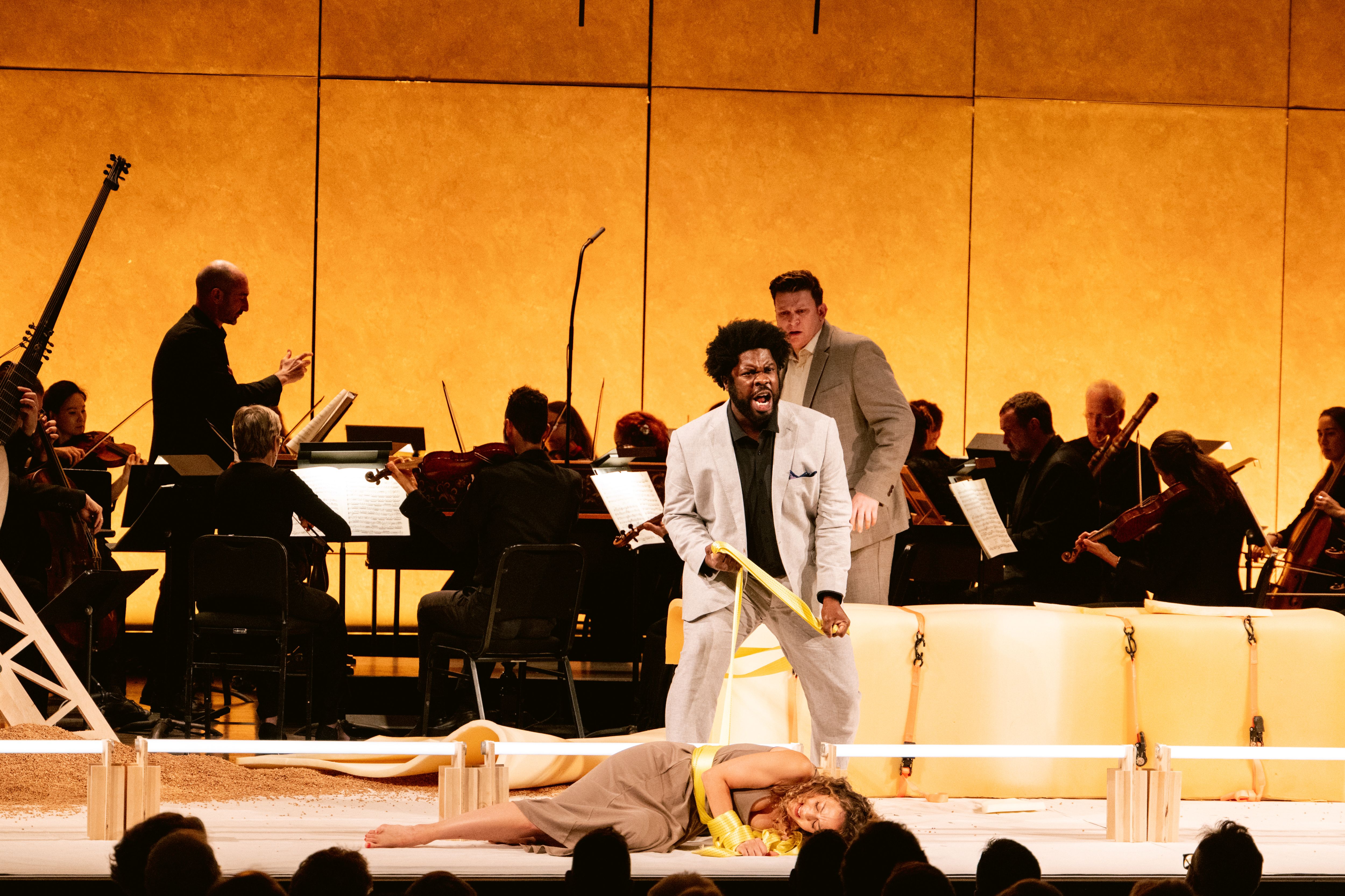 Backdropped by the Philharmonia Baroque Orchestra led by Peter Whelan, Dashon Burton, center, sings Araspe, with Lauren Snouffer and Aryeh Nussbaum Cohen in Tolomeo. | Credit: Kristen Loken