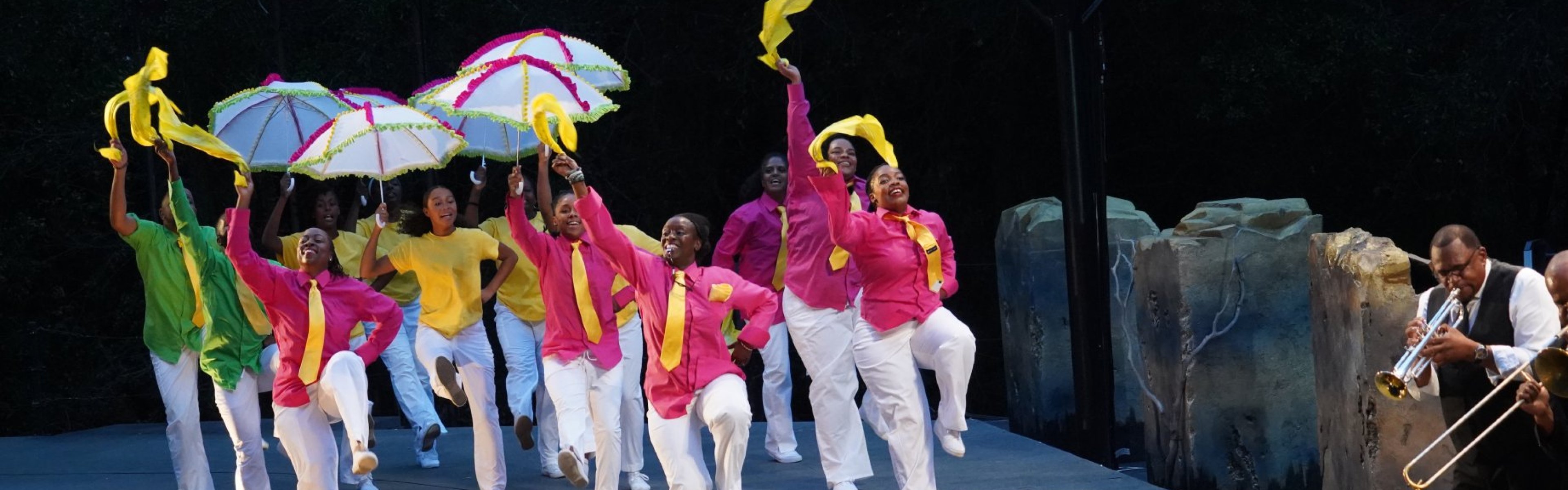 Latanya d. Tigner leads members of Dimensions Dance Theater in a second line parade
