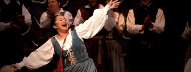Woman in costume singing