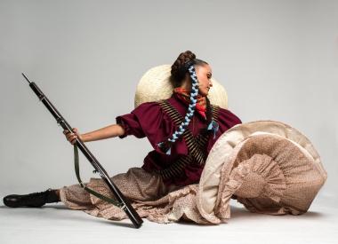 Dancer with rifle