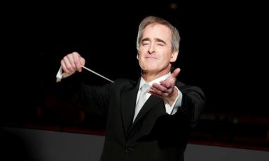 Headshot of Maestro James Conlon with baton