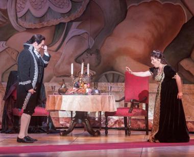 Opera San José concludes its 2022-23 season with a vivid production of Puccini’s "Tosca," presented April 15–30, 2023 at the California Theatre in San Jose. Seen here: Matthew Hanscom as Scarpia and Olga Chernisheva as Tosca in OSJ's 2015 production.