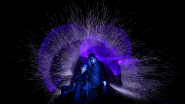 Purple and blue light painted image with two blue faced Lissians