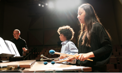 The Colburn Community School of Performing Arts students on stage.