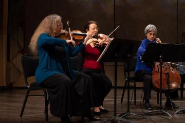 Earplay members: T. Baune, E. Rose, T. Moore performing as a string trio.