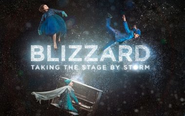 Blizzard Taking the Stage By Storm with the three dancers and musicians floating in snow.