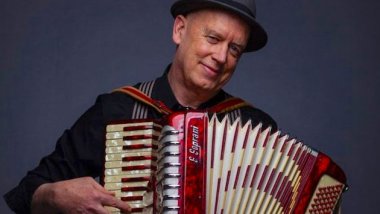 Rinde Eckert playing accordion