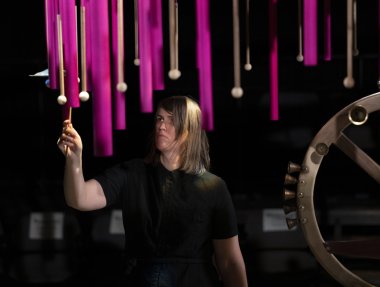Photo of woman playing percussion instrument