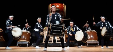 Group members playingn the taiko