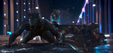 An image of the Marvel character Black Panther on top of a car