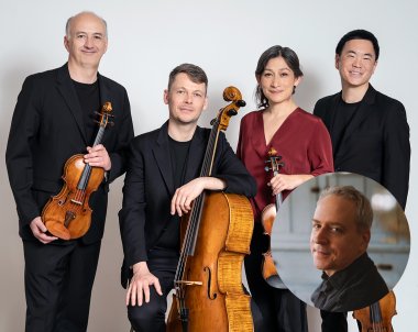 A quartet, holding their instruments, standing in front of a white wall. A man's portrait is in the bottom right corner, as he is the featured pianist.
