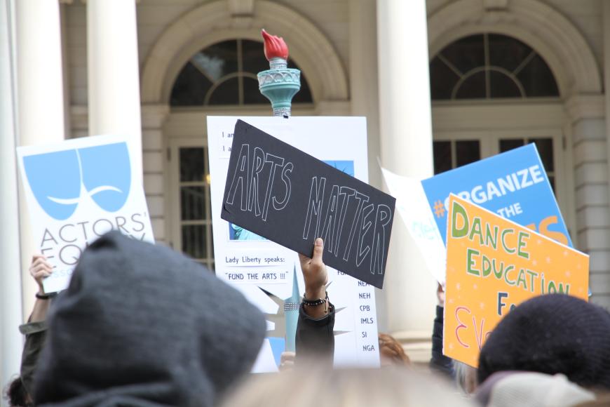 Protesters react