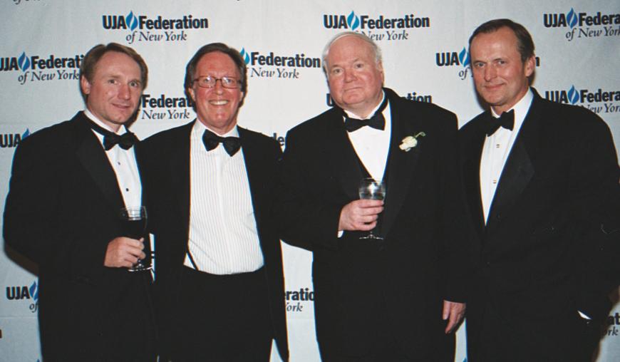 Stephen Rubin with three of his authors
