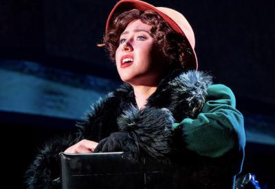Girl in green fur coat and pink hat