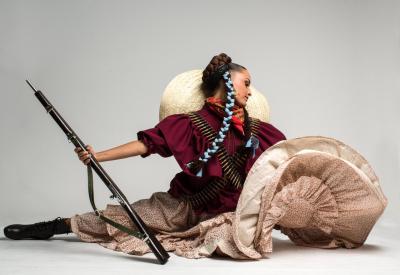 Dancer with rifle
