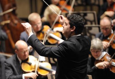  Tito Muños conducts the final program of Symphony San Jose's 20th Anniversary Season