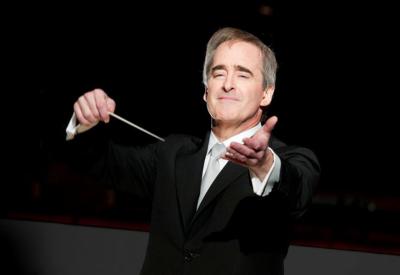 Headshot of Maestro James Conlon with baton