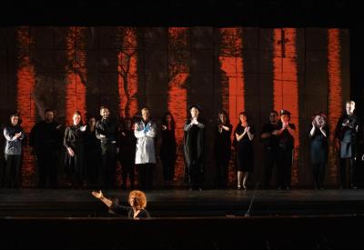The cast of OURLAND with Barbara Day Turner conducting