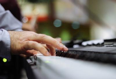 Fingers on piano