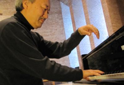 Pierce Emata at the piano promo shot
