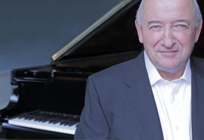 John O'Conor in front of piano