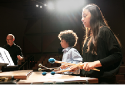 The Colburn Community School of Performing Arts students on stage.