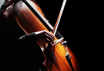 photo of musician holding cello