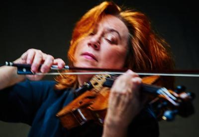 Violist Tatjana Masurenko performing in-concert.
