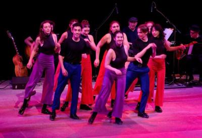 Colburn School tap students in concert on stage.