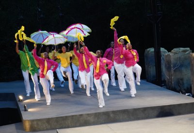 Latanya d. Tigner leads members of Dimensions Dance Theater in a second line parade