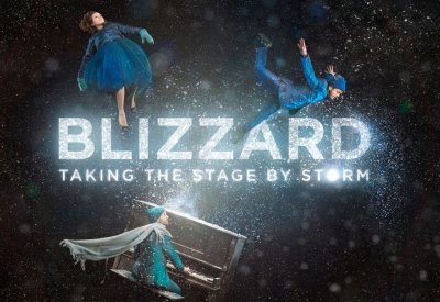 Blizzard Taking the Stage By Storm with the three dancers and musicians floating in snow.