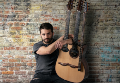 Luca Stricagnoli with his three neck guitar.
