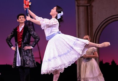 Naomi Le as Clara dancing with her Nutcracker. Photo by Chris Hardy