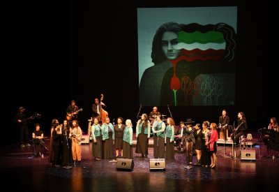 Performers participate in a group song at Let Her Sing 2023 