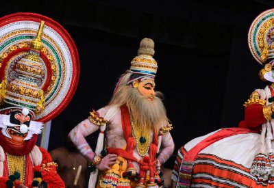 Three dancer/actors performing Balivijayam.