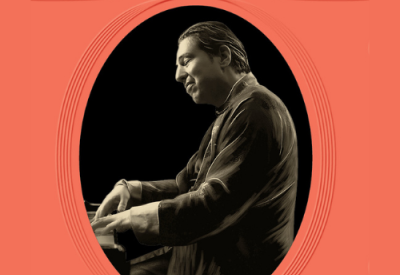 Fazil Say, Piano. Black and white image of a man sitting at a piano