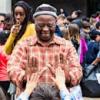 Thamsanga Hlatywayo, owner of the Jikelele Dance Company, welcomes students to Cal Performances’ SchoolTime performance.
