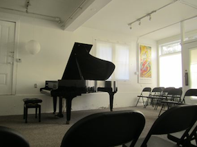 The interior; note acoustics-enhancing folding chairs