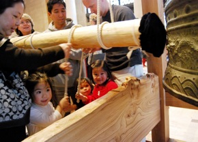 Ringing the Bell<br>Photo by J. Yin