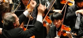 Music Conductor Leo Eylar conducts the Youth Orchestra Leo Eylar