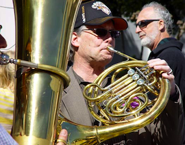 Even in the midst of conflict, Bruce Roberts' gleaming French horn looks good<br>Photos by Michael Strickland Even in the midst of conflict, Bruce Roberts' gleaming French horn looks good Photos by Michael Strickland