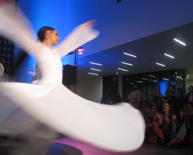 Miriam Peretz's whirling dervish dance<br>at the de Young Tut celebration<br>Photo by Nicole Schach