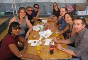 The gang relaxes before rehearsal in Switzerland. (Left to right) Nicole Cash (horn), Katie Kadarauch (viola), Jonathan Vinocour (viola), David Kim (viola), Carey Bell (clarinet), Tim Dent (percussion), Jessica Valeri (horn), Sebastian Gingras (cello)<br>Photo by Nan Keeton