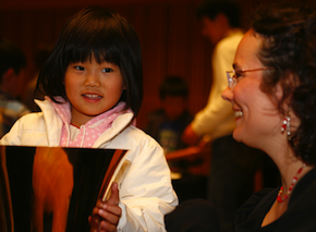 Hands-on experience of vibrations from a large bell
