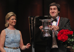 Cliburn Chairman Carla Thompson presents the gold medal and winner's cup to Kholodenko last year Photo by Ron T. Ennis/Fort Worth Star-Telegram