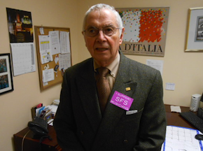 Horacio Rodriguez, Davies Hall head usher (since 1980), wearing the sticker seen everywhere Friday night