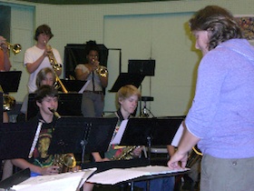 Band Director Sarah Cline rehearsing the ensemble Sarah Cline