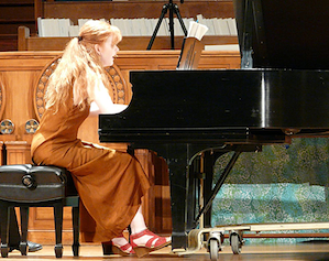 Sarah Cahill, using her forearm to play clusters in Henry Cowell’s High Color