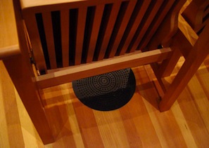 The unusual wooden chairs have silent airconditioning vents under them The unusual wooden chairs have silent airconditioning vents under them