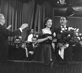 Dorothy Warenskjold and Melton on the <em>James Melton Show</em>, with conductor Frank Black